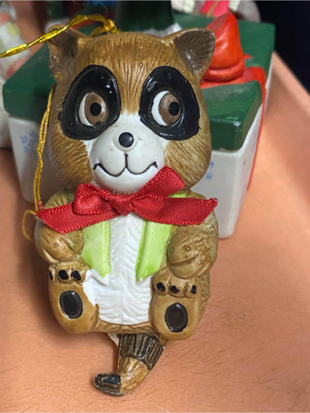 Vintage Tattle Tails Holiday Raccoon Ornament with Red Bow